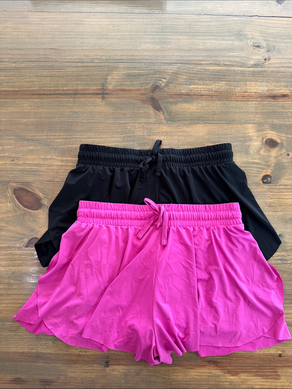 2-in-1 flowy athletic shirts with compression shirts underneath.